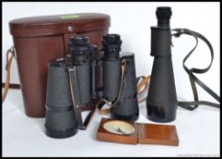 A pair of Carl Zeiss binoculars together with a wooden cased pocket compass and a Telstar monocular.