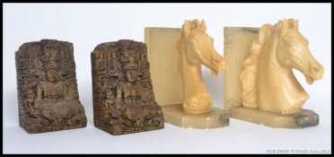 Two pairs of vintage 20th century bookends - one being of Indian design of stone construction with