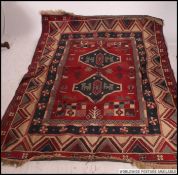 A large Turkish thin weave floor rug.