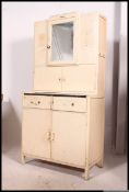 A mid century painted retro dresser cabinet.