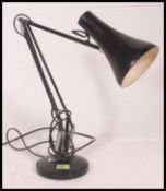 A post war Industrial black Herbert Terry anglepoise desk lamp with pendant shade and circular