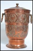 An unusual large Islamic Iranian ice bucket of embossed form with lined interior and lid.