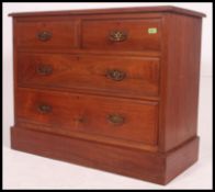 An Edwardian ash 2 over 2 cottage chest of drawers.