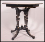 A Victorian Aesthetic movement parcel gilt centre table.