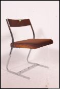 A retro cantilever Merrow Associates  chrome and velour dining chair c.