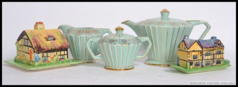 A Sadler Art Deco ceramic Teapot with matching water pot and creamer,