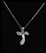 An 18ct white gold crucifix cross and necklace chain. The top and cross with 1pnt diamonds.
