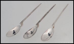 A set of 3 silver hallmarked Roman goose neck spoons .