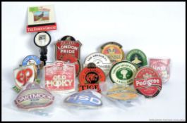 A collection of 15x vintage pub / breweriana advertising beer pump labels.