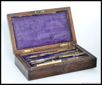 A charming Victorian era architects drawing set, most pieces with ivory handles or details.