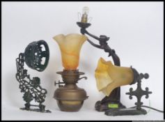 A collection of vintage wall lights and table lamps to include a deco style lamp,