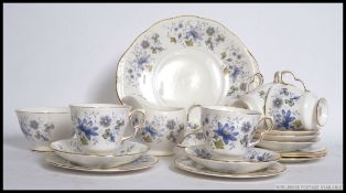 Colclough - A mid 20th century tea service by Colclough decorated with blue flowers consisting of