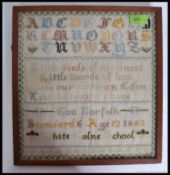 An Essex Victorian tapestry needlepoint sampler by Eva Norfolk Aged 12 1883 at White Colne School.