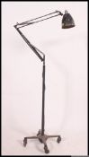 A large Herbert Terry anglepoise Industrial floor standing anglepoise lamp set over quadruped