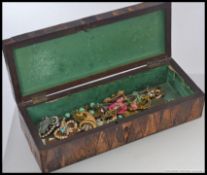 A collection of costume jewellery to include enamel peacock brooch, enamel flower brooch,