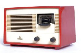 A vintage retro plastic Siemens portable radio, highly coloured with unusual moving dial.