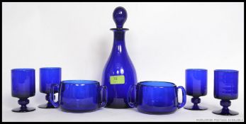 A Thomas Webb Bristol Blue Glass coloured decanter,