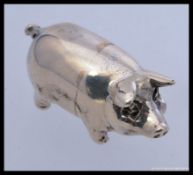 A silver hallmarked  pig figurine.