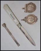 A silver hallmarked penknife with mother of pearl handle together with a silver propelling pencil,