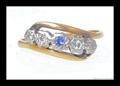 An 18ct yellow gold sapphire and diamond ladies ring. 2.