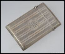 A silver machine turned silver hallmarked calling card case, hinged lid, Birmingham Assay,