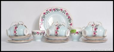 A  mid century 30 piece bone china floral tea service by Colclough consisting of nine trio's,