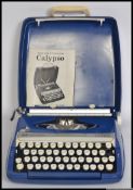 A little used retro cased Smith Corona Calypso typewriter,