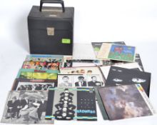 A collection of 45rpm Vinyl singles all by Madness.