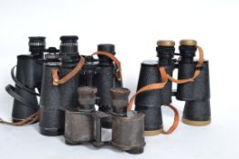 A collection of 4x sets of binoculars - Green Kat, Pathescope, another pair dated 1918 but unnamed.