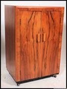 A 1930's Art Deco walnut side cabinet.