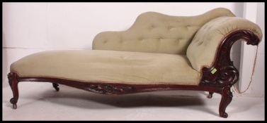 A Victorian mahogany upholstered Chaise Longue sofa daybed.