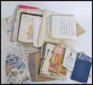A collection of vintage stamps and greetings cards together with postcards etc,