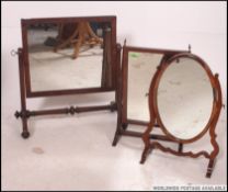 A collection of dressing mirrors including a C19th oval mirror with string inlays and two others