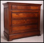 A 19th century French country walnut chest of drawers.