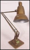 A good early 20th century Herbert Terry gilt finish industrial anglepoise lamp on square terraced