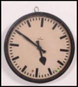 A very large vintage industrial factory electric  wall clock by Siemens, batons display to the face.