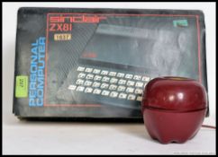 A vintage ZX81 Spectrum home computer in the original box.