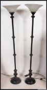 A pair of late 20th century uplighter standard lamps,