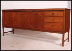 An exceptional Nathan teak wood Danish influence ' circles ' sideboard dresser.