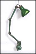 An excellent early Industrial heavy metal wall / block mount anglepoise lamp in original green