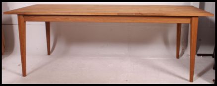 A very large contemporary French style oak refectory dining table.