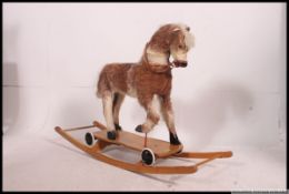 A vintage / retro two in one rocking horse / push along,