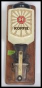 A vintage wall mounted Porcelain 2nd part of the 20th century advertising Coffee grinder from the