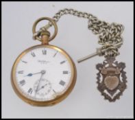 A Waltham USA pocket watch with albert chain and silver medallion.