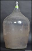 An vintage / retro heavy unusual dumpy bulbous shaped clear glass continental olive jar bottle.