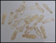 A collection of Chinese oriental gaming counters - all mother of pearl made, with carved decoration.