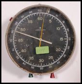 A vintage industrial mid 20th century factory wall hanging stop clock by Junghans,