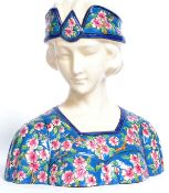 A 20th century Longwy style ceramic bust of a 1930's flapper girl. Hand painted.  Approx 24cm x 25.