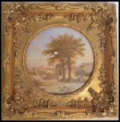 An antique style Viennese wall plaque with printed pictorial, in a gilt frame.