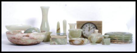 A collection of retro Onyx items to include bowls, Clock, eggs,
